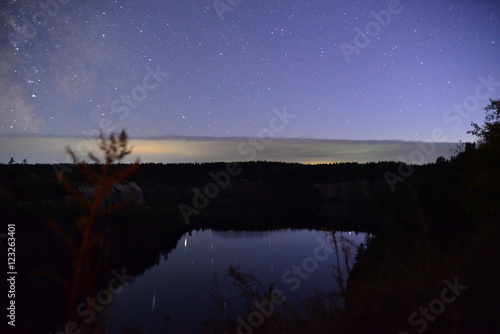 The night sky over the flooded crater
