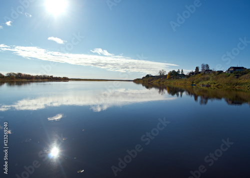 Fall River, reflected in the water autumn trees.