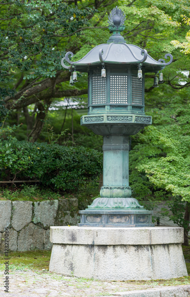 Kyoto, Japan - September 15, 2016: In the garden of the Shinnyo-do Buddhist Temple stand multiple Japanese Lanterns. Kyoto, Japan - September 15, 2016: In the garden of the Shinnyo-do Buddhist Temple stand multiple Japanese Lanterns.