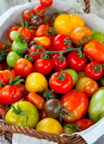 colorful tomatoes in basket