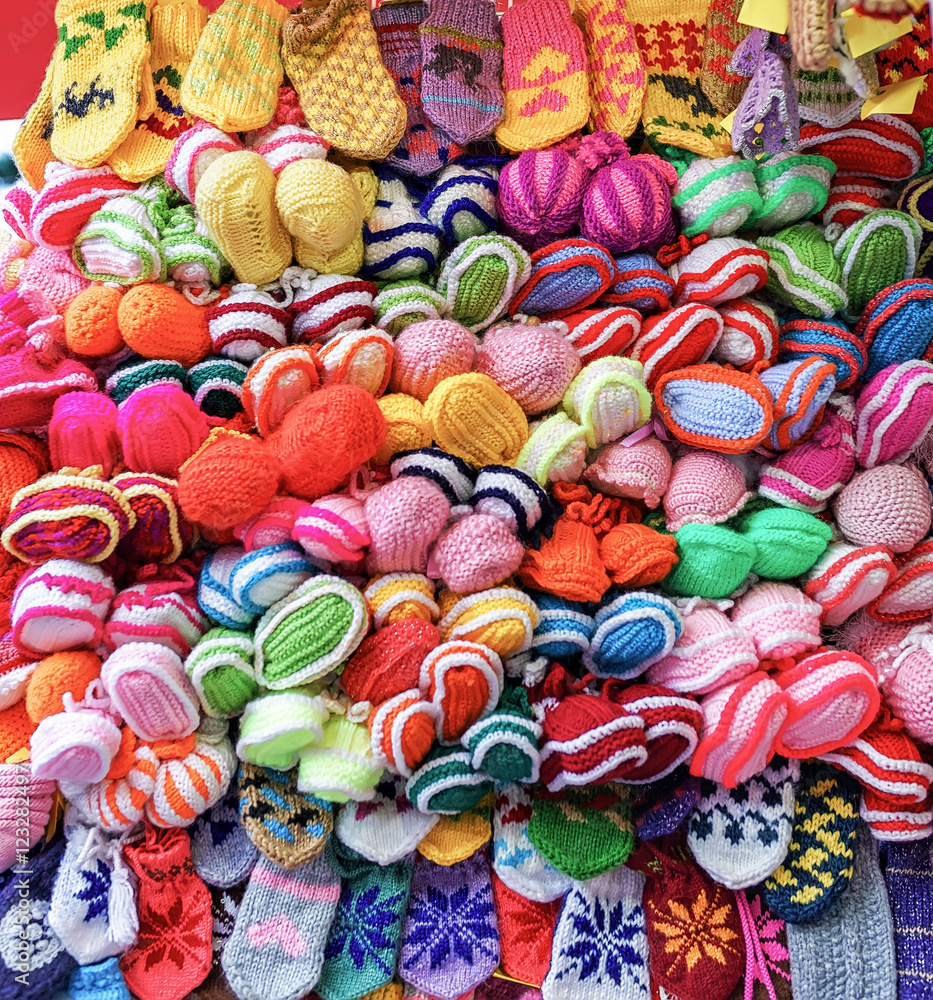 Pile of handmade woolen gloves at Riga Christmas market
