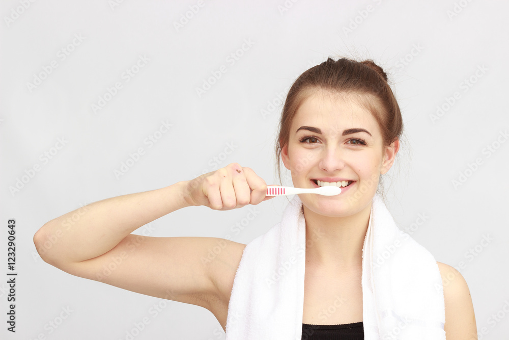 Beautiful woman with a great smile holding toothbrush Beautiful woman with a great smile holding toothbrush