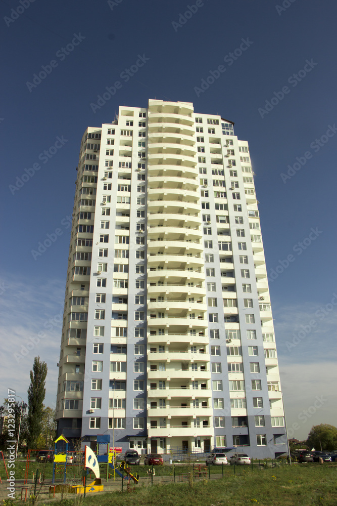 Fototapeta premium Multi-storey, residential new home on a sunny day
