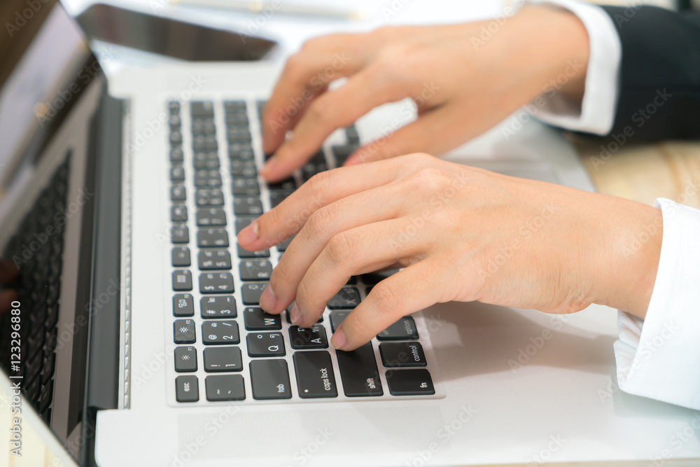 Closeup of business woman hand typing on laptop keyboard . Closeup of business woman hand typing on laptop keyboard .