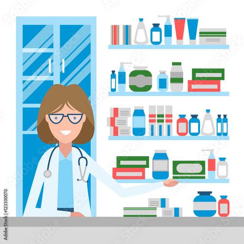 Pharmacist in drug store. Beautiful smiling woman in white sitting near shelf with medication. Woman in glasses.
