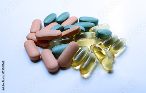 Colourful pills on a white background