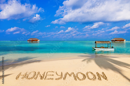 Word Honeymoon on beach photo