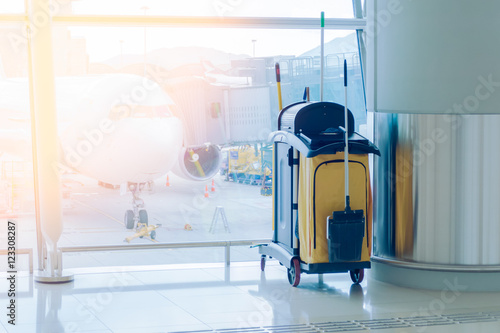 mop bucket and set of cleaning equipment in the airport