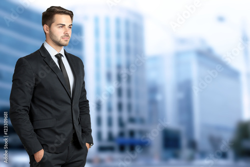 Businessman on blurred buil...