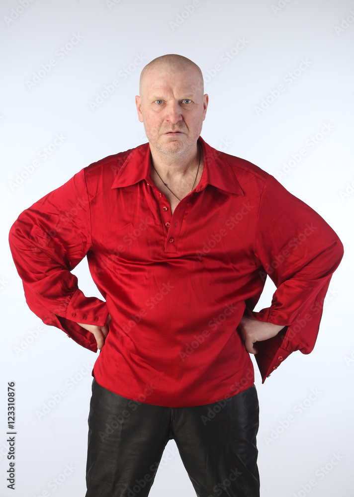 Portrait of an adult man in a red shirt Portrait of an adult man in a red shirt