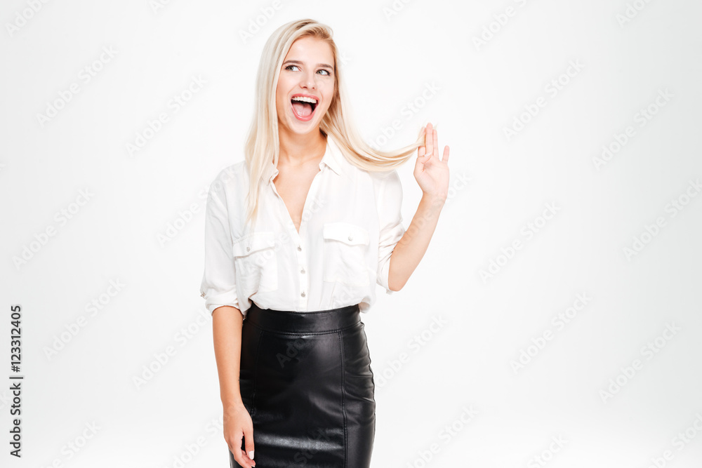 Happy funny young businesswoman standing and having fun Happy funny young businesswoman standing and having fun