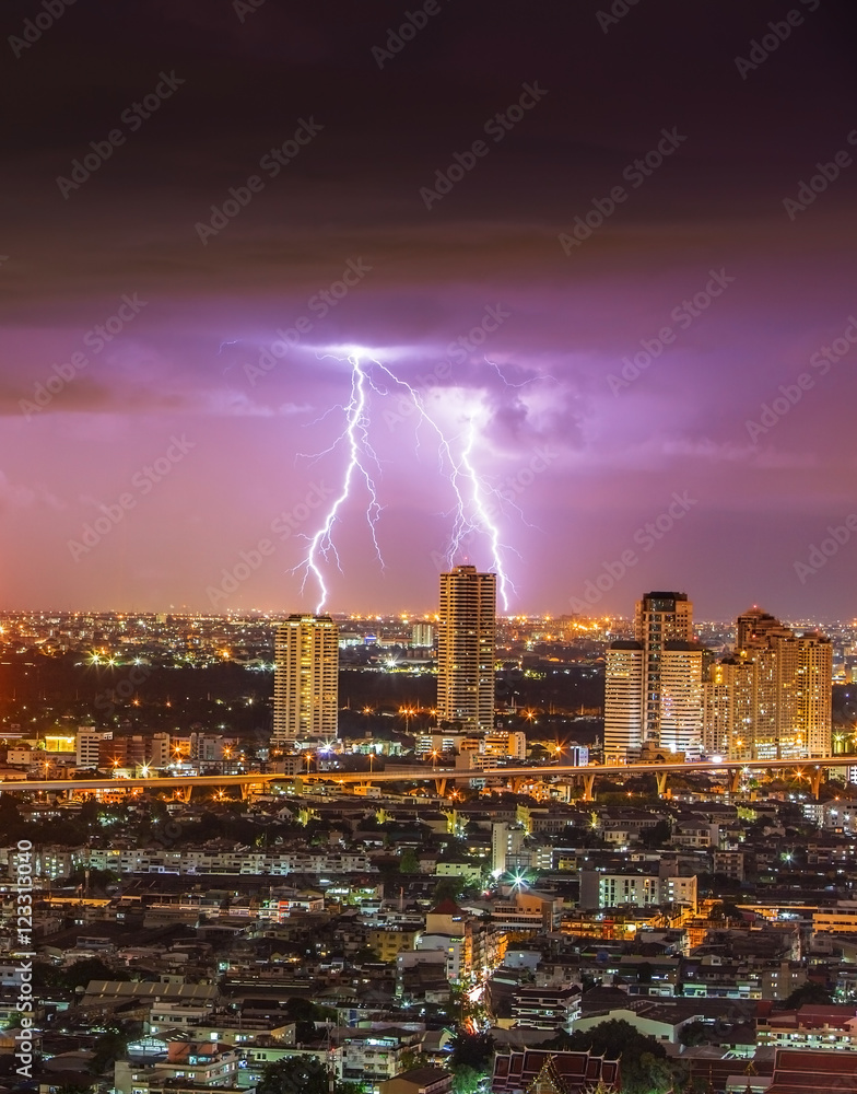 Naklejka premium Lightning storm over Bangkok city, Night cityscape