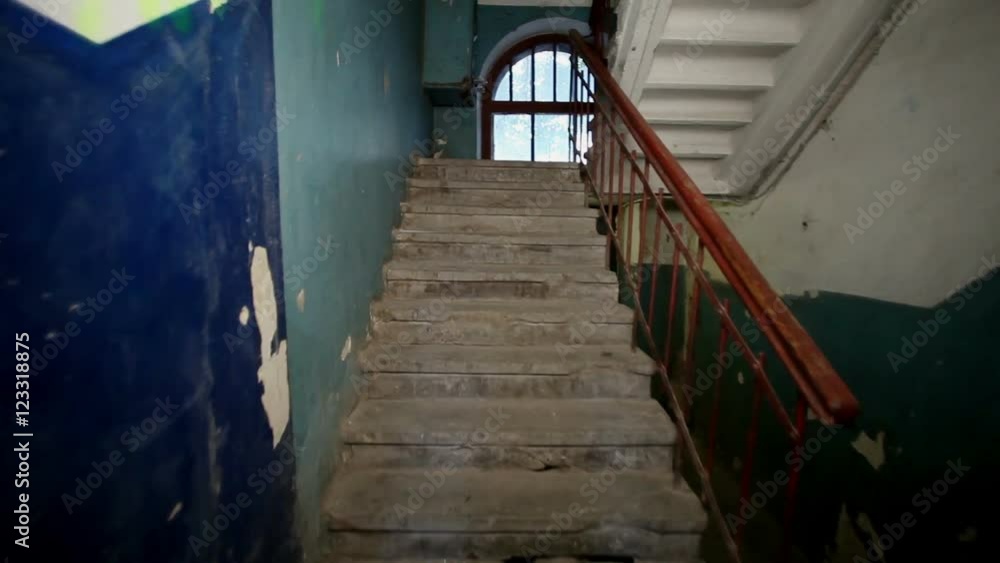 Views of a russian town. Old staircase in the stairwell of a multistory residential building. HD Views of a russian town. Old staircase in the stairwell of a multistory residential building. HD