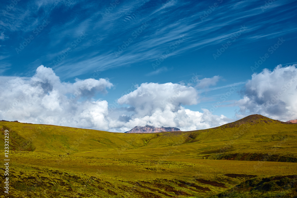 Travel to Iceland. Beautiful Icelandic landscape with mountains, sky and clouds. Trekking in national park Landmannalaugar