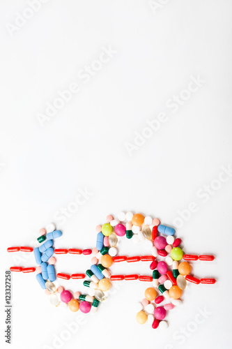 Pills and tablets on white background with dolar symbol in vivid