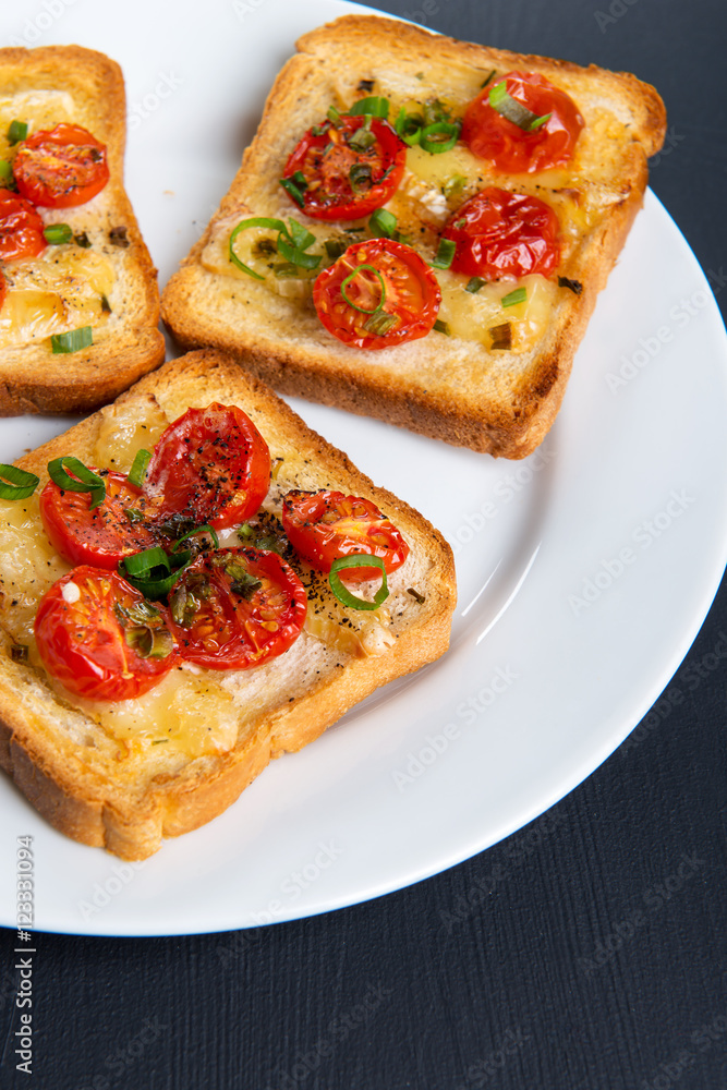 Grilled toast with camembert and cherry tomatoes Grilled toast with camembert and cherry tomatoes