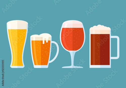 Canvas Print Set of beer glasses isolated on blue background