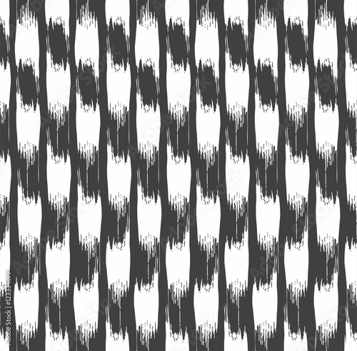 Abstract spots seamless background, dark grey. Vector pattern with ripped, white spots on a dark gray background. Vertical decor.   