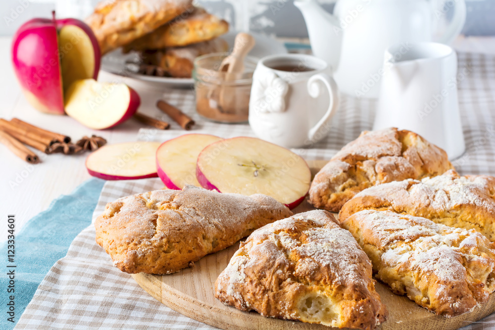Apple scones for breakfast with apple cider glaze. Selective focus.