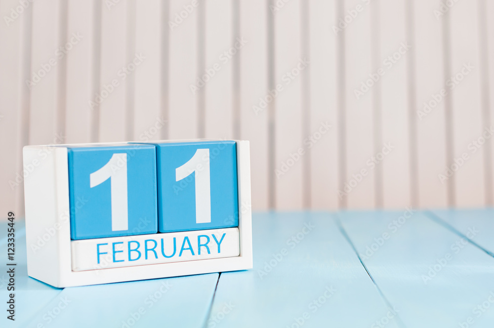 February 11th. Day 11 of month, calendar on wooden background. Winter concept. Empty space for text February 11th. Day 11 of month, calendar on wooden background. Winter concept. Empty space for text