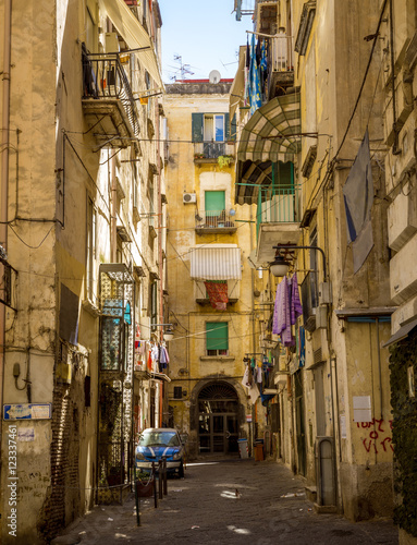 Narrow street in old town of Naples, Italy