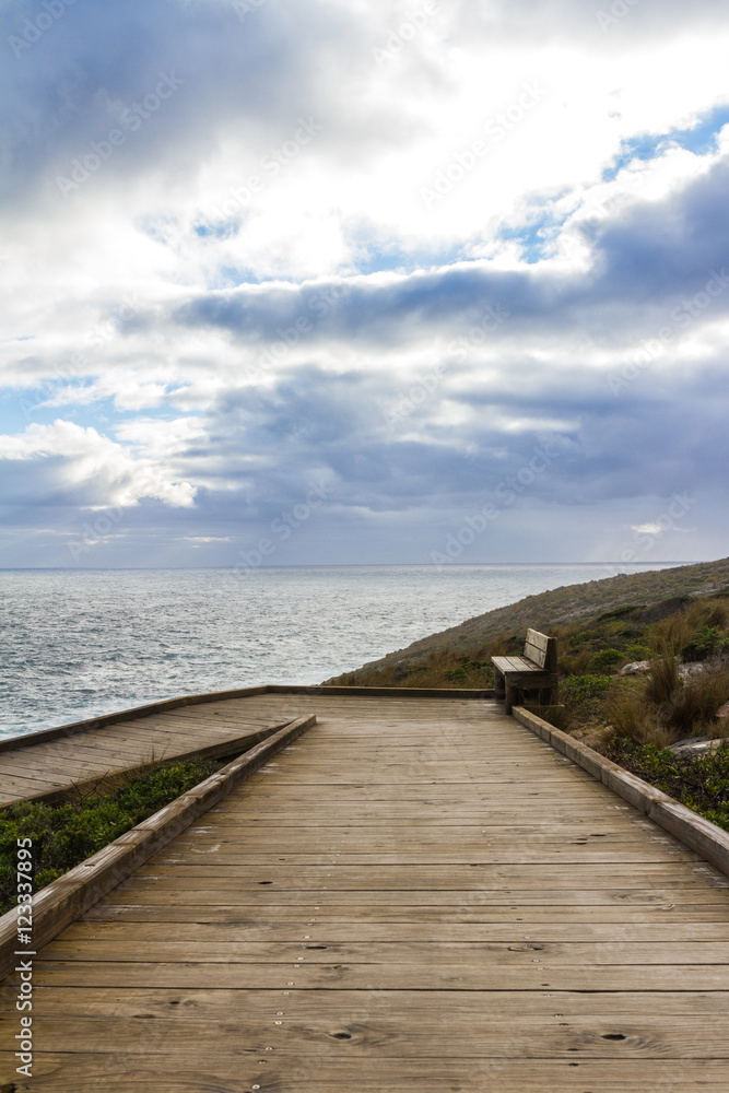 Stormy clouds with a wooden walkway in Australia, Kangaroo Island Stormy clouds with a wooden walkway in Australia, Kangaroo Island