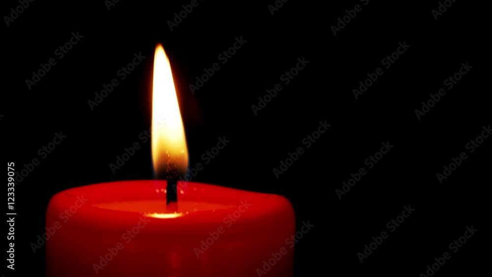 Kerze brennt zum 1. Advent an Weihnachten Kerze brennt zum 1. Advent an Weihnachten