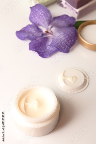 Still life with cream jar  flower and soap