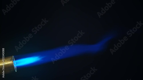 Closeup of butane burner spurting blue flame from copper nozzle photo