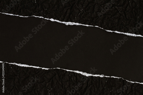 Papier peint Ripped crumpled black paper with space