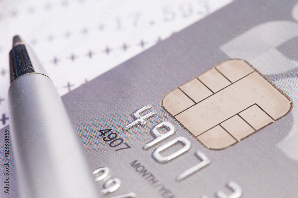 Finance Concepts, pen and credit card with passbook as backgroun Finance Concepts, pen and credit card with passbook as backgroun