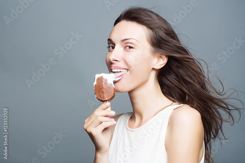 pretty girl eating ice lolly