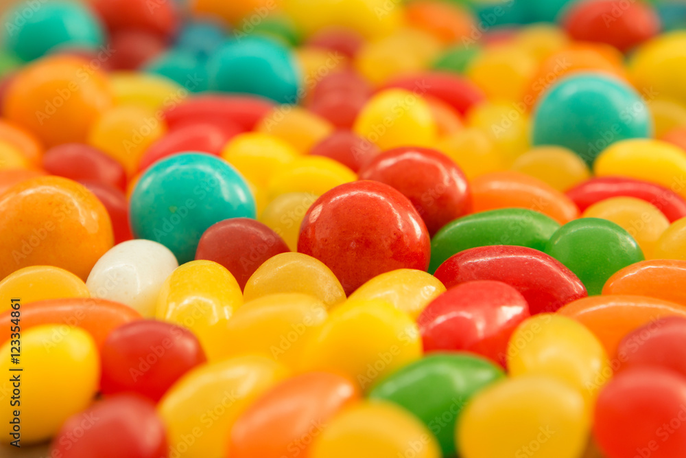 Colorful jelly beans close to wallpaper Colorful jelly beans close to wallpaper