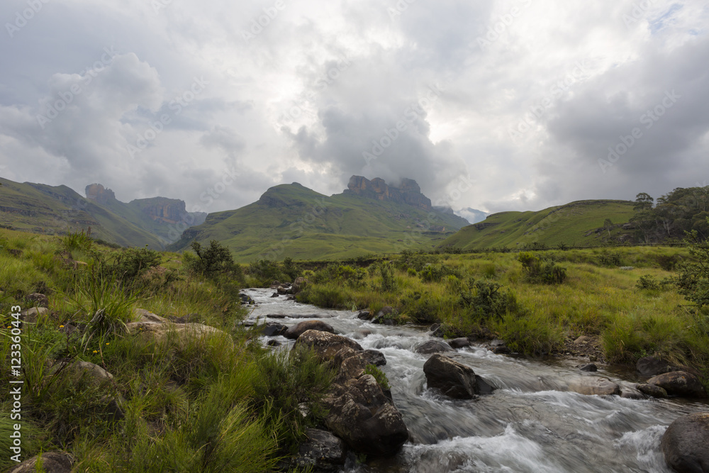 Mountain stream and rain clouds Mountain stream and rain clouds