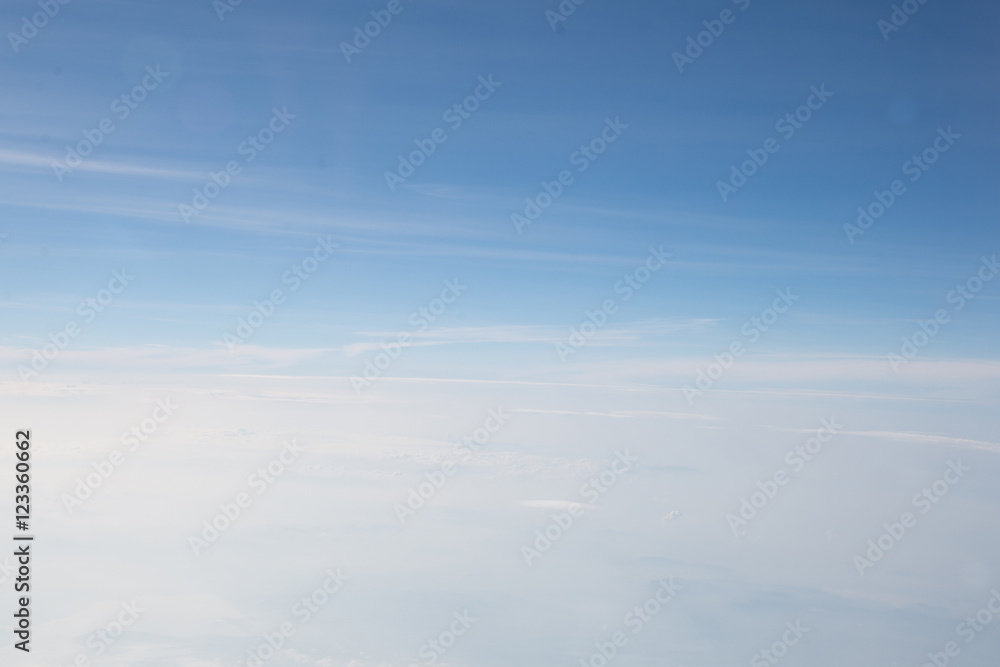blue  sky  viewed from an airplane window