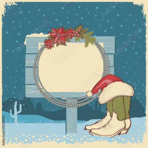 Western Cowboy christmas card with cowboy boots and lasso on woo
