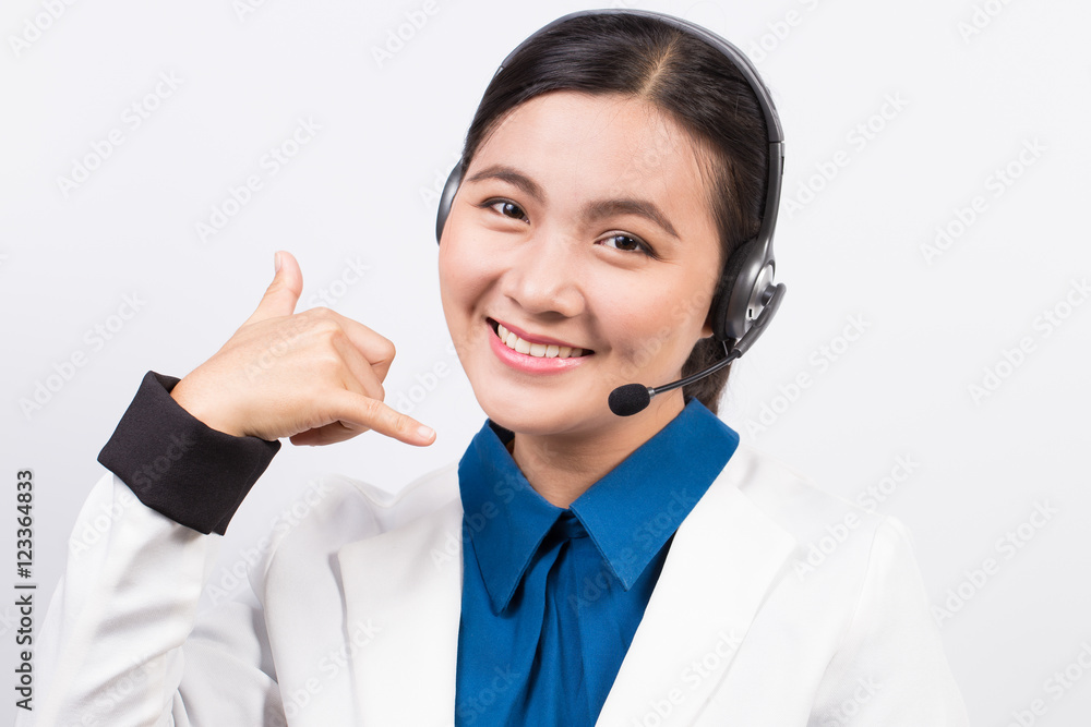 Operator in headset and she make her hand be telephone symbol Operator in headset and she make her hand be telephone symbol