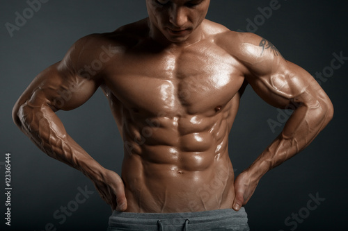 Strong Athletic Man Fitness Model Torso showing six pack abs.
