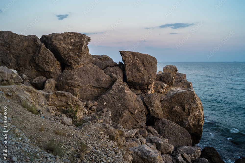 Sea and rocks at sunset