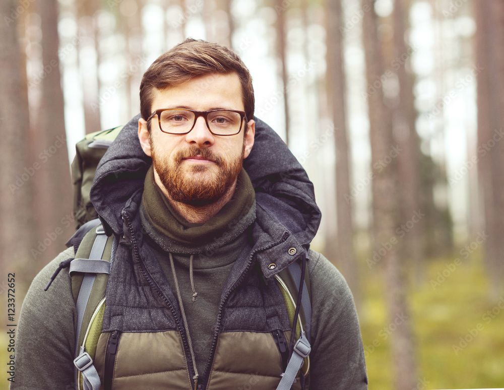 Portrait of a young traveler man in the woods Portrait of a young traveler man in the woods