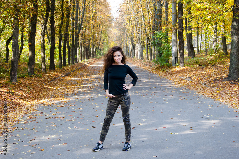 Fototapeta premium pretty woman in autumn forest