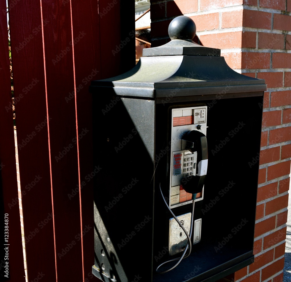 Phone Booth / A rare sight, this small public phone booth still in working order. Phone Booth / A rare sight, this small public phone booth still in working order.