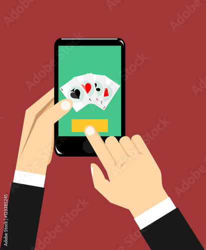 4 aces playing cards on smartphone. Hand hold phone, finger touch screen. Cellphone poker.
