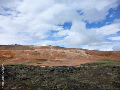 Geothermal hot springs natural area with steaming sulfur pools and vibrant color