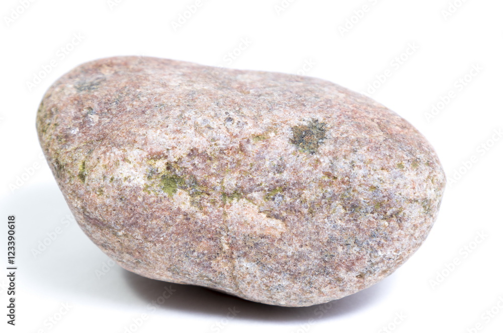 Single natural stone on white background Single natural stone on white background