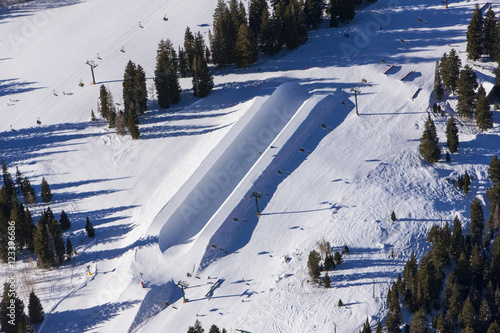 Riding the half pipe at Brighton Ski Resort
