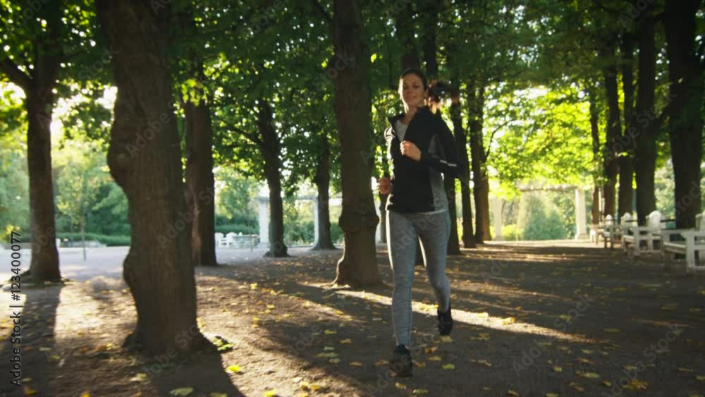 Young Woman and Man Running Together Forward Towards Camera in Bright Sunny Day. Shot on RED Cinema Camera (UHD). Young Woman and Man Running Together Forward Towards Camera in Bright Sunny Day. Shot on RED Cinema Camera (UHD).