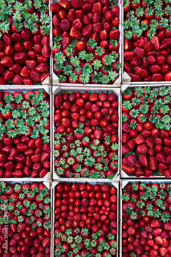 Boxes of strawberries on display at a street stall