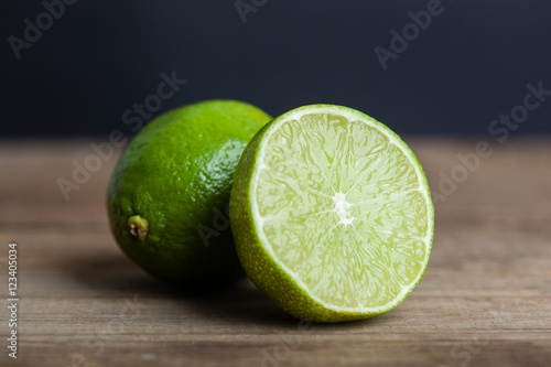 green lime on wooden rustic table