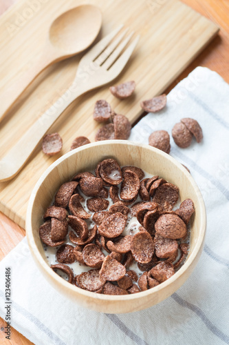 Bowl of chocolate flakes with milk for breakfast